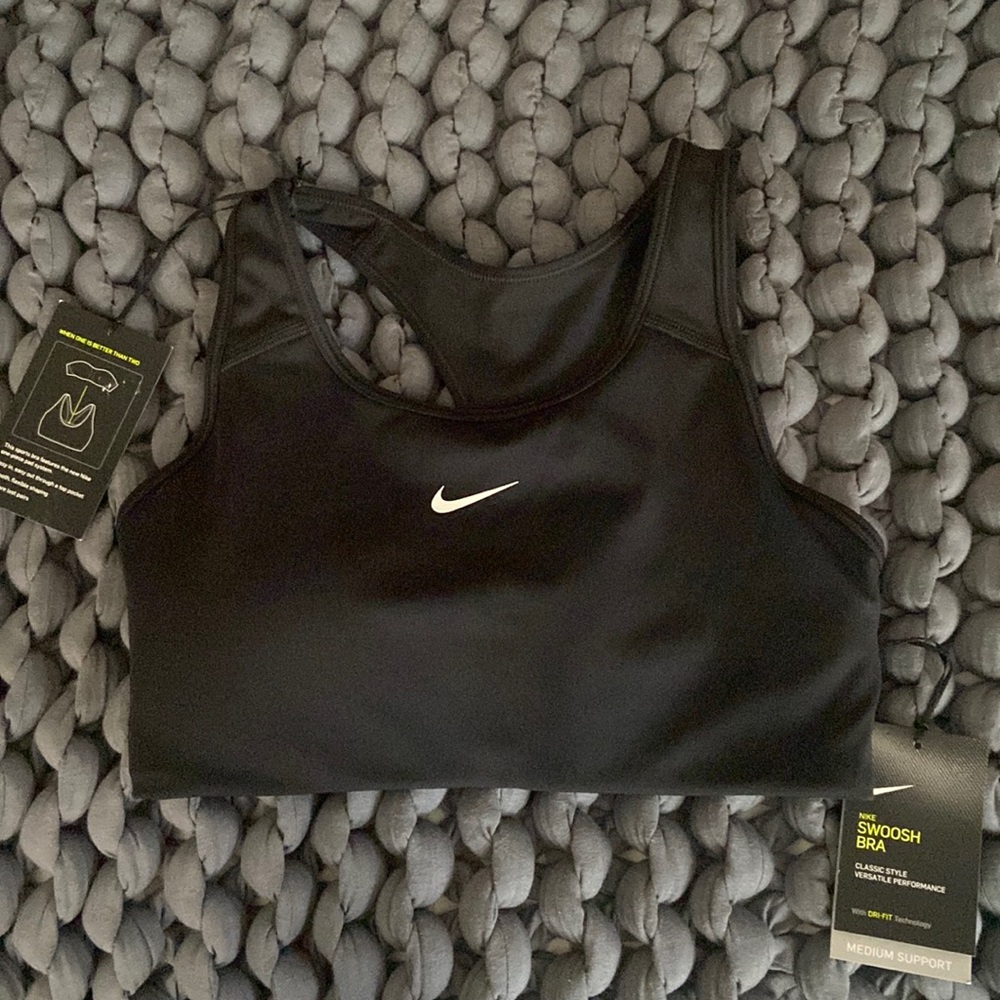 NWT Nike Swoosh sports bra. Medium. Black never worn